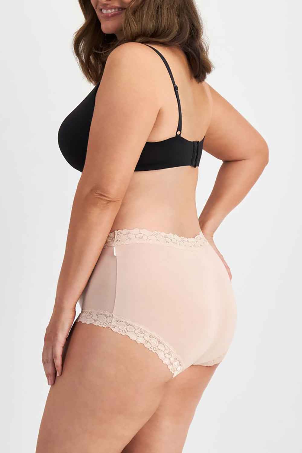 A model wearing the Parisienne Bamboo Full Brief in colour Dusk, from the front, cropped image