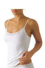 A model wearing the Parisienne Cotton Cami in colour White (White), from the front, cropped image