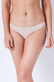 Model Phoebe wearing size 10 of the Bamboo Naturals Bikini Brief in colour Dusk, from the front, cropped image