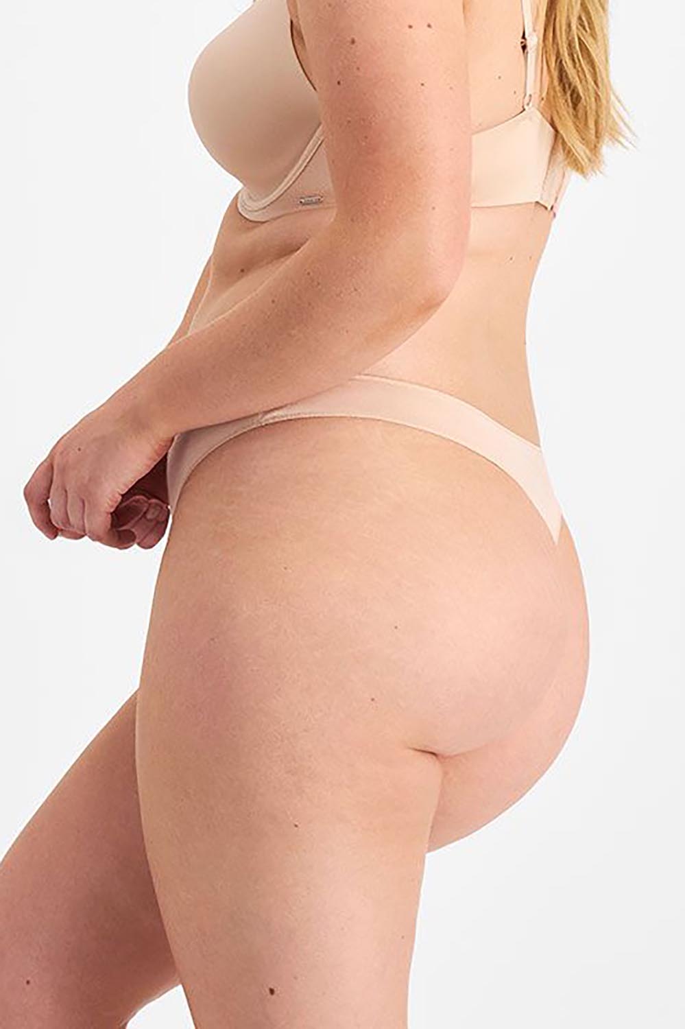 A model wearing the Bamboo Natural NPLP Gin colourString - Dusk, from the back