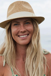 Product shot of the Palm Beach Raffia Packable Fedora - Naturalivory in colour Naturalivory, from the front