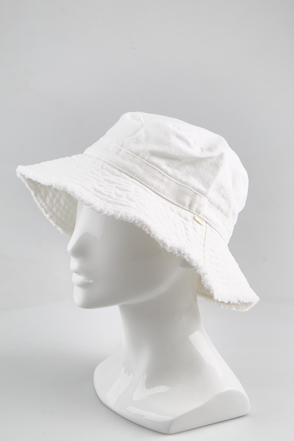 Model Genericm wearing size sample of the Sunny Bay Floppy Hat - White in colour White, from an angle