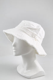 Model Genericm wearing size sample of the Sunny Bay Floppy Hat - White in colour White, from an angle