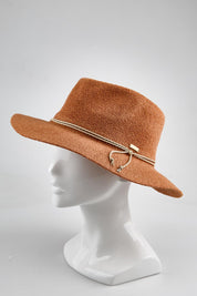 Model Genericm wearing size sample of the Sadie Safari Hat - Rust in colour Rust, from an angle