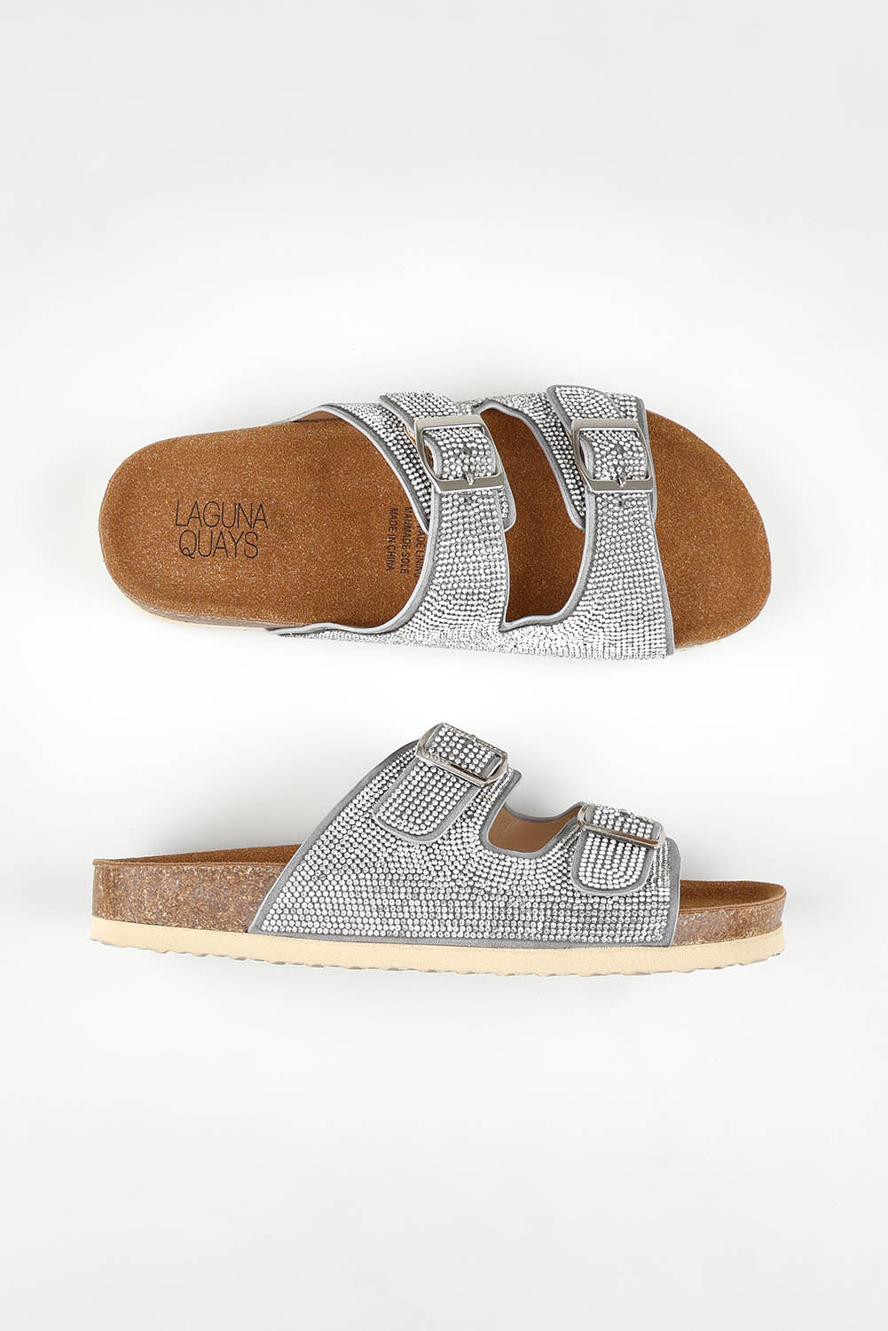 A model wearing size 37 of the Twain Slide in colour Silverdia (Grey), from the front, showing the whole outfit