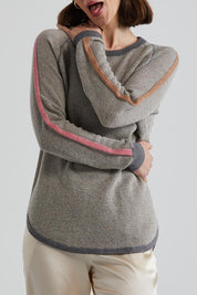 A model wearing the Waffle Lambswool Crew in colour Marl (Grey), from the front, cropped image