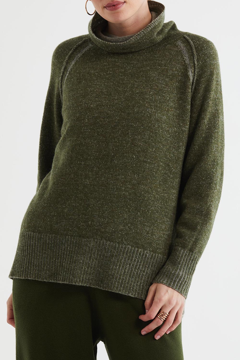 A model wearing the Twoin colourTone Lambswool Rollneck - Olive (Green), from the front, cropped image