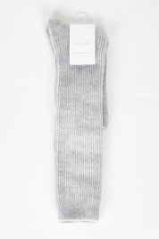 A model wearing size OneSize of the Slouchy Sock in colour Greymarle (Grey), from the front, showing the whole outfit