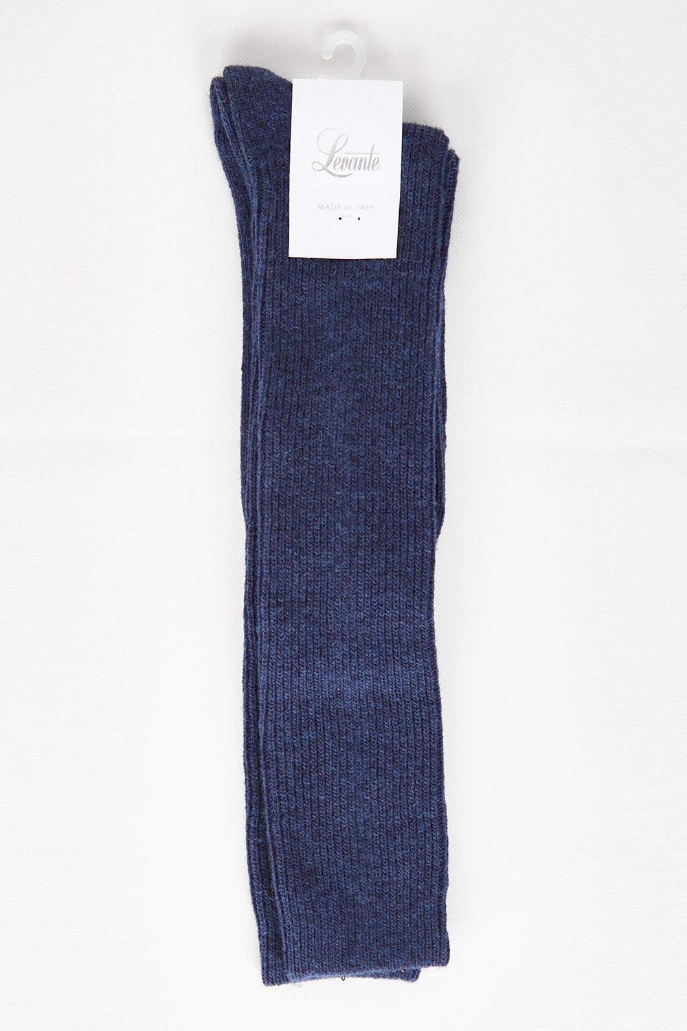 A model wearing size OneSize of the Slouchy Sock in colour Ink (Blue), from the front, showing the whole outfit