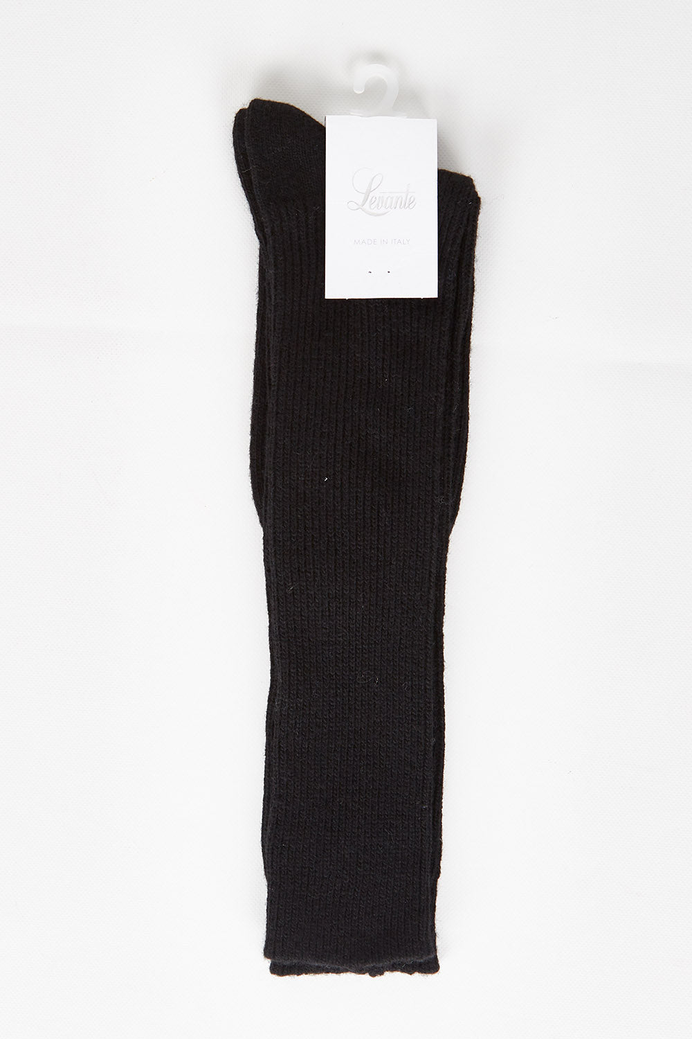 A model wearing size OneSize of the Slouchy Sock in colour Nero (Black), from the front, showing the whole outfit