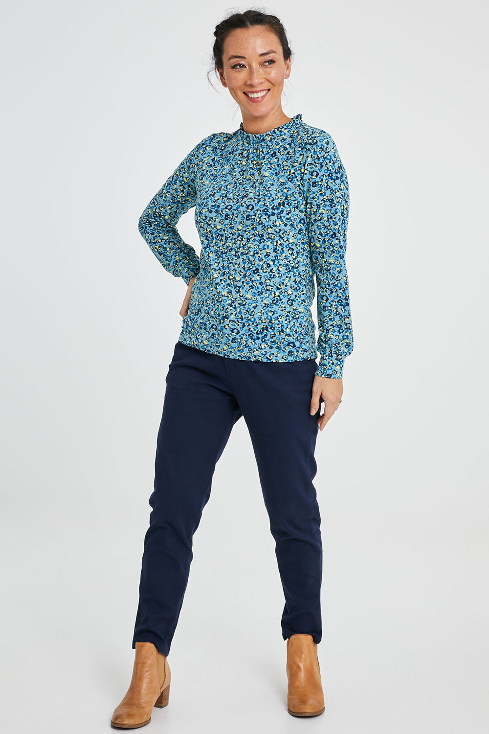Model Katie wearing size 10 of the Bracelands Top in colour Teal (Green), from the front, showing the whole outfit