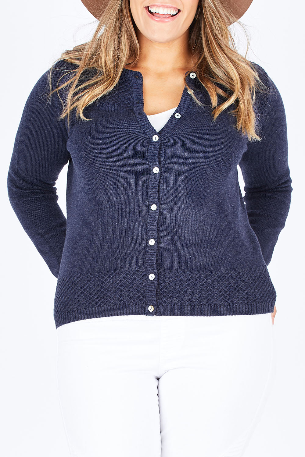 Model Natalia wearing size 14 of the Vintage Knit Cardigan in colour NavyMarl (Blue), from the front, cropped image