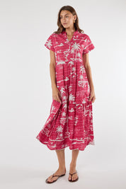 Model Genericm wearing size sample of the Alura Midi Dress – Melon in colour Melon, from the front