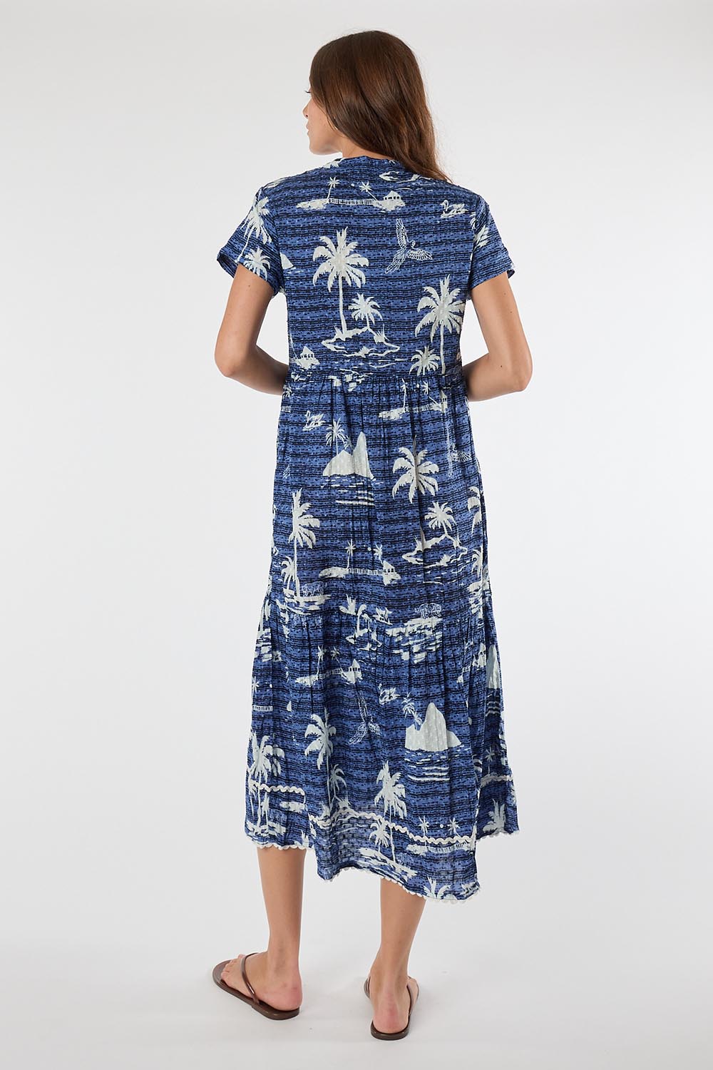 Model Genericm wearing size sample of the Alura Midi Dress – Ocean in colour Ocean, from the front
