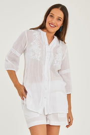 Model Georgia wearing size S of the Ariana Shirt in colour White (White), from the front, cropped image
