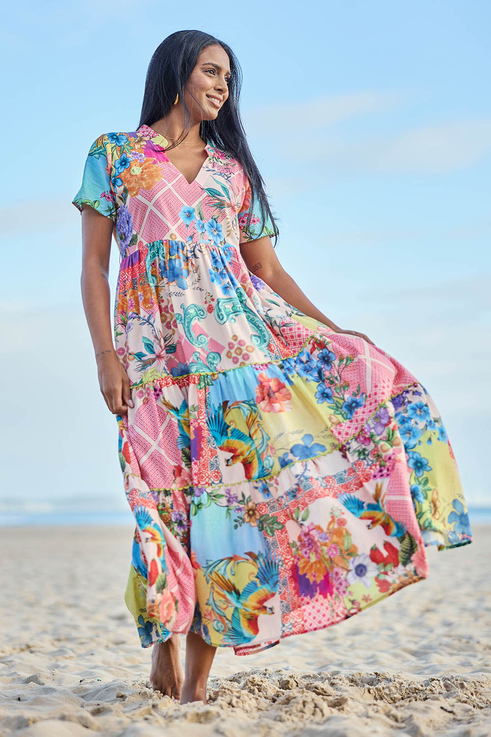 Model Eshan wearing size 10 of the Astrid Midi Dress – Dustypink in colour Dustypink, from the front