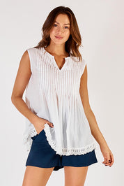 A model wearing the Beach Cotton Short in colour Navy (Blue), from the front, cropped image