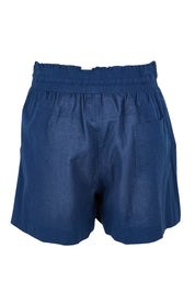 Product shot of the Beach Cotton Short in colour Navy (Blue), from the back