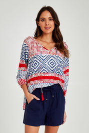 Model Madeline wearing size S of the Beach Short in colour Navy (Blue), from the front, cropped image