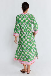 Model Genericm wearing size sample of the Beth Midi Dress – Fern in colour Fern, from the front