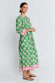 Model Genericm wearing size sample of the Beth Midi Dress – Fern in colour Fern, from the front