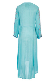Product shot of the Brazil Dress in colour Aqua (Blue), from the back