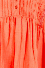 Product shot of the Briah Cotton Dress - Coral in colour Coral, showing detail