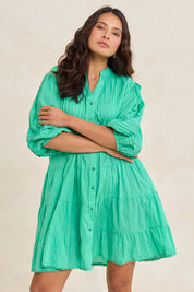Model Tahnee wearing size S of the Celeste Cotton Dress in colour Sea (Green), from the front, showing the whole outfit