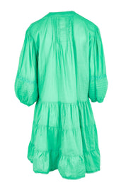 Product shot of the Celeste Cotton Dress in colour Sea (Green), from the back