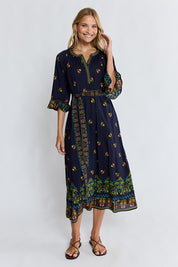 Model Genericm wearing size sample of the Emma Midi Dress – Ebony in colour Ebony, from the front
