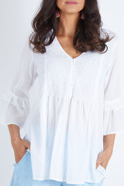 Model Gemma wearing size S of the Freya Shirt in colour White (White), from the front, cropped image