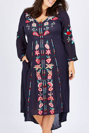 Model Mae wearing size XXL of the Hayman Dress in colour Navy (Blue), from the front, cropped image