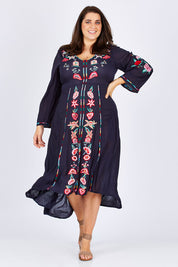 Model Mae wearing size XXL of the Hayman Dress in colour Navy (Blue), from the front, showing the whole outfit