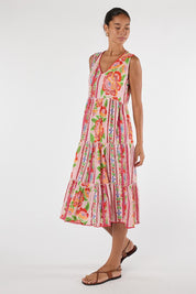 Model Genericm wearing size sample of the Ines Sleeveless Midi Dress – Shell in colour Shell, from the front