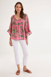 Model Madeline wearing size S of the Island Girl Top in colour Musk (Pink), from the front, showing the whole outfit