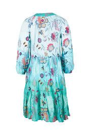 Product shot of the Jerri Tiered Dress in colour Lagoon (Green), from the back