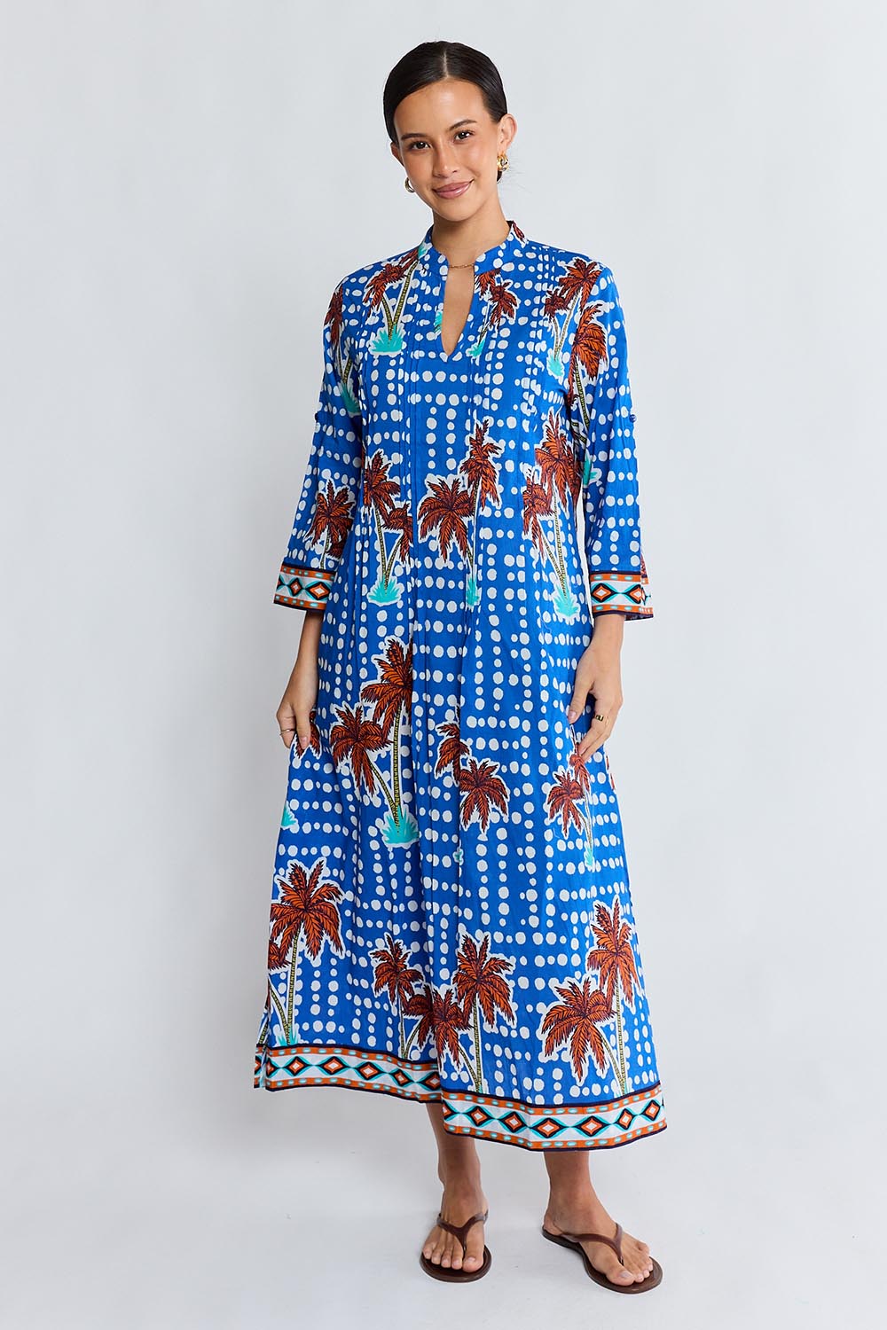 Model Genericm wearing size sample of the Koloa Midi Dress – Ocean in colour Ocean, from the front