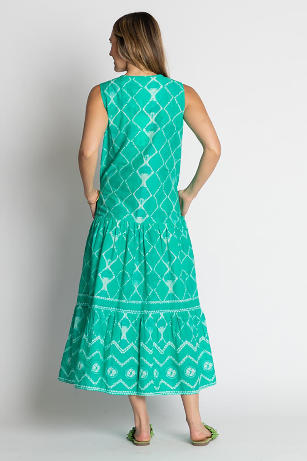 A model wearing the Kumo Cotton Maxi Dress in colour Sea (Green), from the back