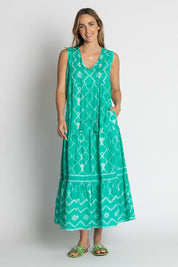 A model wearing the Kumo Cotton Maxi Dress in colour Sea (Green), from the front, showing the whole outfit