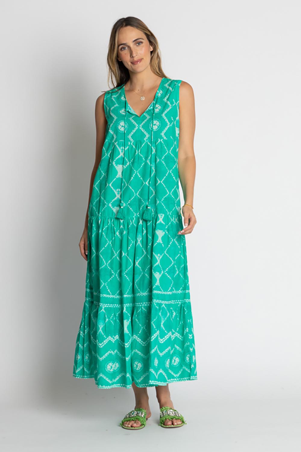 A model wearing the Kumo Cotton Maxi Dress in colour Sea (Green), from the front, showing the whole outfit