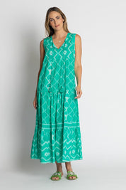 A model wearing the Kumo Cotton Maxi Dress in colour Sea (Green), from the front, showing the whole outfit