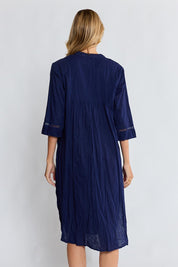 Model Genericm wearing size sample of the Laverne Kaftan Dress – Navy in colour Navy, from the back