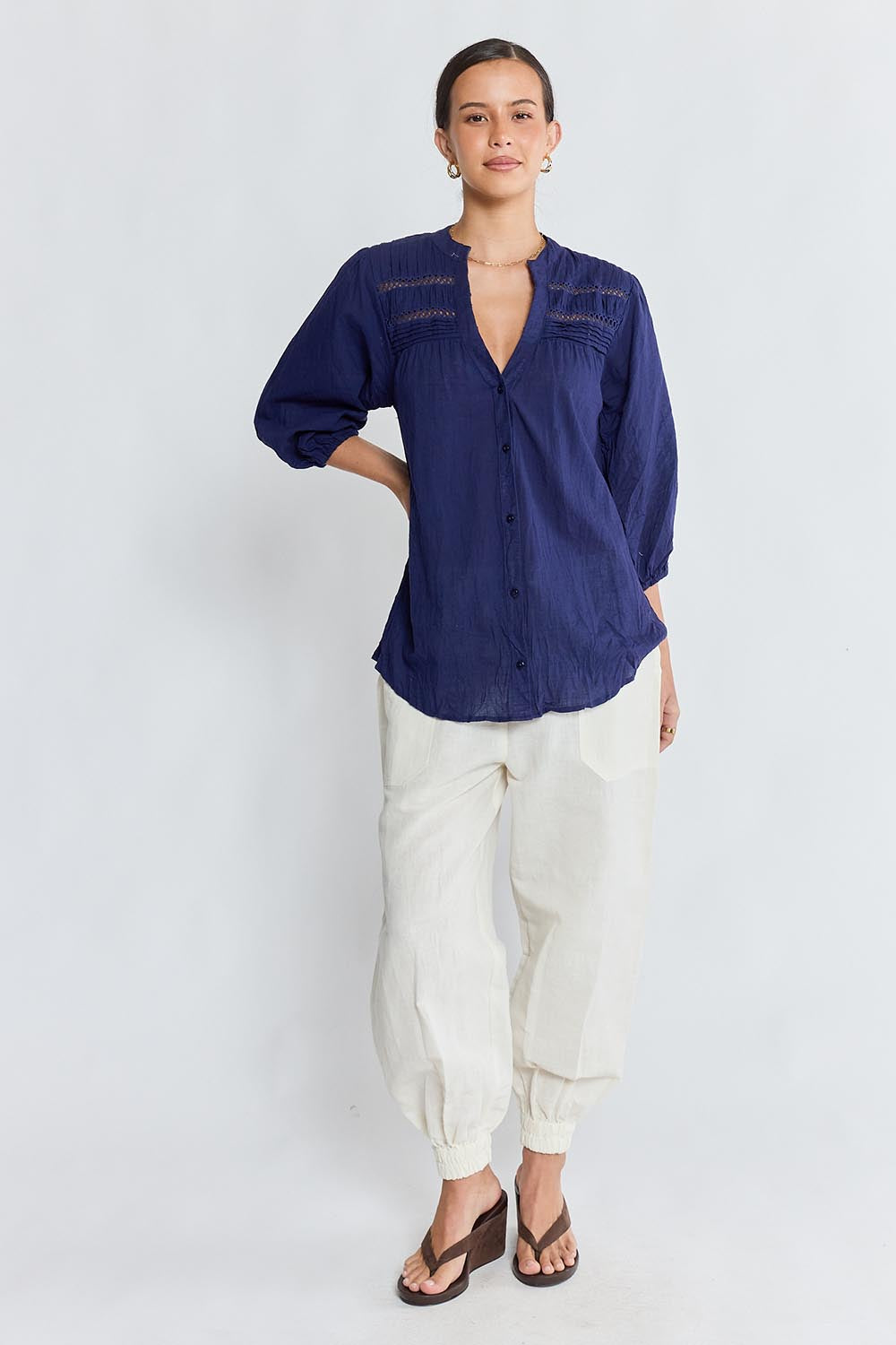 Model Genericm wearing size sample of the Laverne Tuck Shirt – Navy in colour Navy, from the front