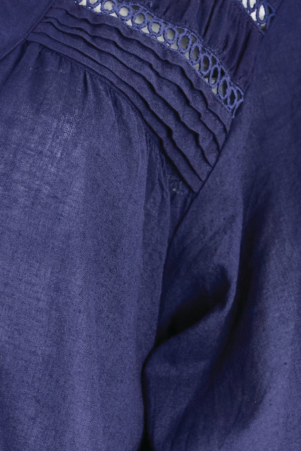 Product shot of the Laverne Tuck Shirt – Navy in colour Navy, showing detail