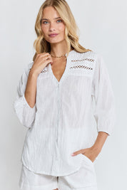 Model Genericm wearing size sample of the Laverne Tuck Shirt – White in colour White, in a cropped view