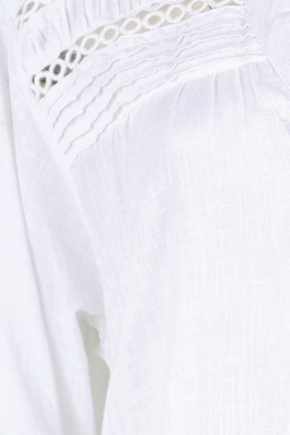 Product shot of the Laverne Tuck Shirt – White in colour White, showing detail