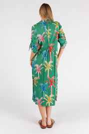 A model wearing the Leilani Cotton Midi Dress in colour Sea (Green), from the back