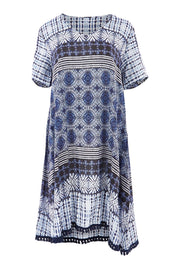 Product shot of the Lotus Dress in colour Navy (Blue), from the front