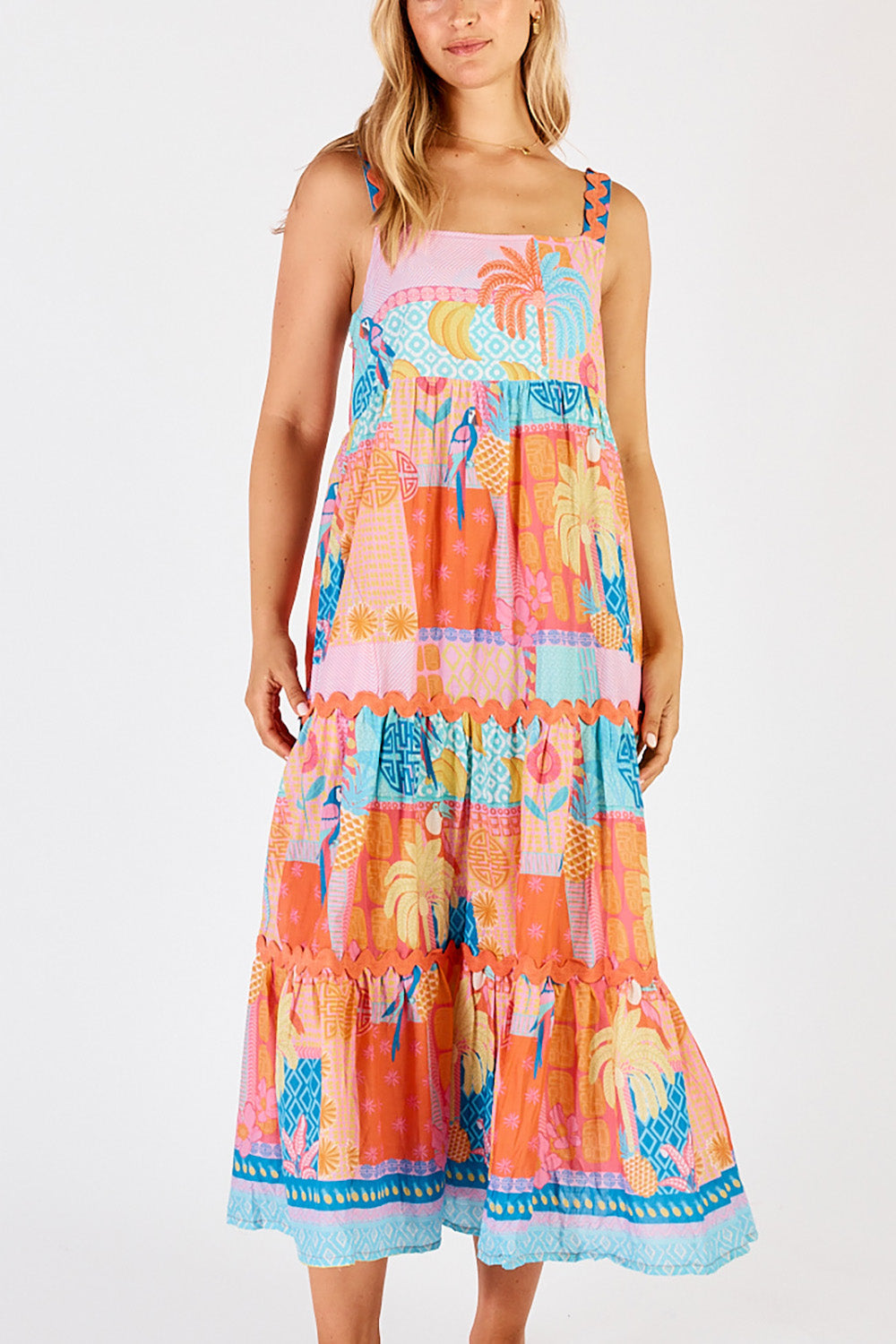 A model wearing the Luna Cotton Sundress in colour Candy, from the front, cropped image