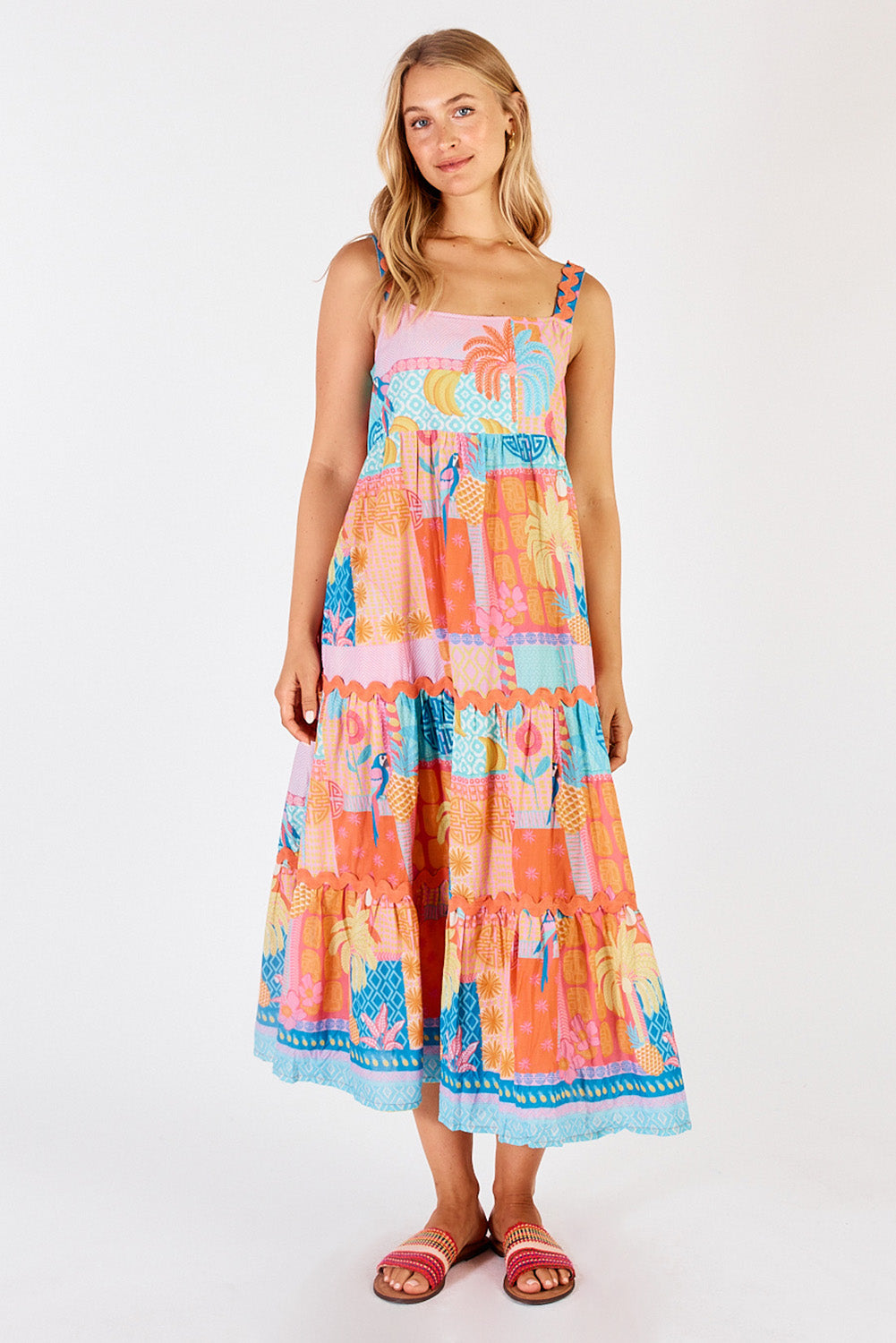 A model wearing the Luna Cotton Sundress in colour Candy, from the front, showing the whole outfit